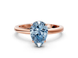 Rose gold Fancy Blue Pear Cut Solitaire Diamond Ring with Prong Setting and Plain Band