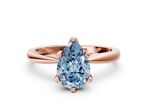 Rose gold Fancy Blue Pear Cut Solitaire Engagement Ring with Six-Prong Setting and Tapered Band