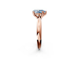 Rose gold Fancy Blue Pear  Cut Solitaire Engagement Ring with Tapered Band and Four-Prong Setting 3