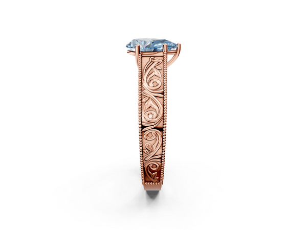 Rose gold Fancy Blue Pear Cut Diamond Solitaire Ring with Engraved Band and Four-Prong Setting