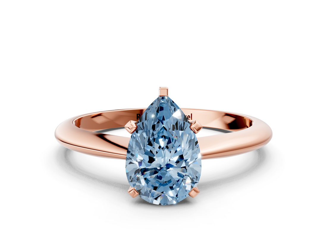 Rose gold Fancy Blue Pear  Cut Solitaire Ring with Four-Prong Setting on a Classic Band_47