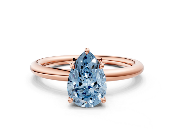 Rose gold Fancy Blue Pear Cut Diamond Solitaire Ring with Thin Band and Four-Prong Setting