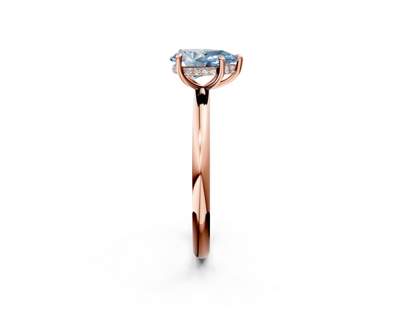 Rose gold Fancy Blue Pear Cut Diamond Solitaire Ring with Thin Band and Four-Prong Setting