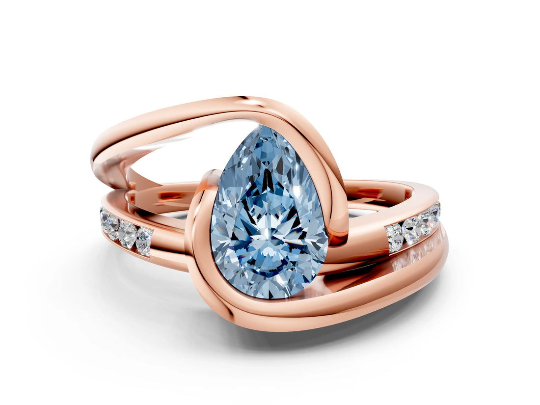 Rose gold Fancy Blue Pear Cut Solitaire Tension-Set Diamond Split Shank Ring