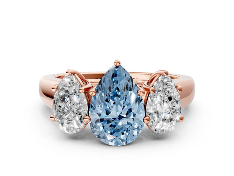Rose gold Fancy Blue Pear Cut Three-Stone Diamond Ring with Prong Setting on a Classic Band
