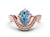 Rose gold Fancy Blue Pear  Solitaire Diamond Engagement Ring with Pave Band and Four-Prong Setting