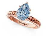 Rose gold Fancy Blue Pear  Solitaire Diamond Engagement Ring with XO Engraved Band and Four-Prong Setting 1
