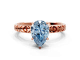 Rose gold Fancy Blue Pear  Solitaire Diamond Engagement Ring with XO Engraved Band and Four-Prong Setting