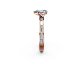 Rose gold Fancy Blue Pear  Solitaire Diamond Ring with Channel-Set Baguette Band and Four-Prong Setting_82