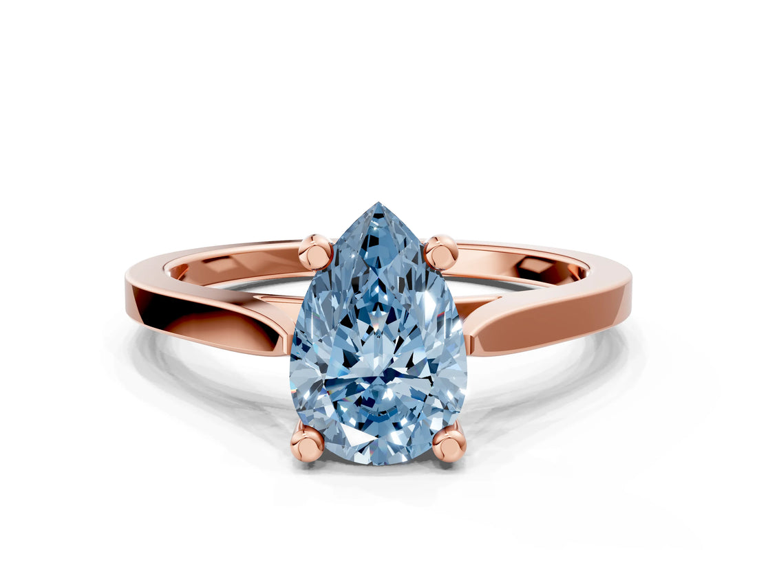 Rose gold Fancy Blue Pear  Solitaire Diamond Ring with Four-Prong Setting and Tapered Band 1
