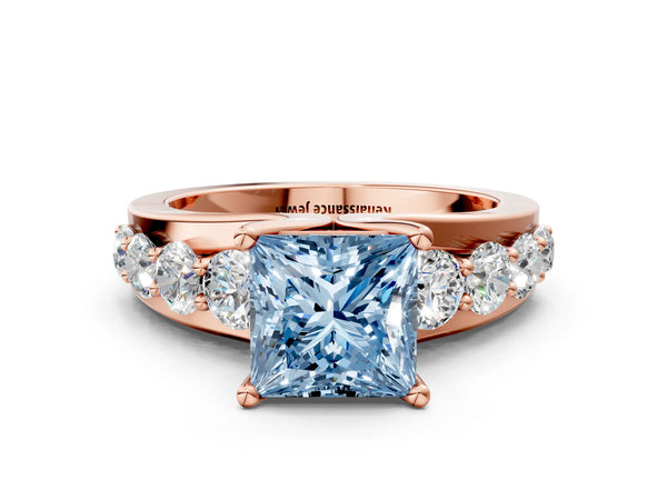 Rose gold Fancy Blue Princess  Brilliant Solitaire with Side Stones on a Pave Band and Four-Prong Setting