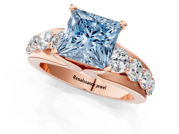 Rose gold Fancy Blue Princess  Brilliant Solitaire with Side Stones on a Pave Band and Four-Prong Setting