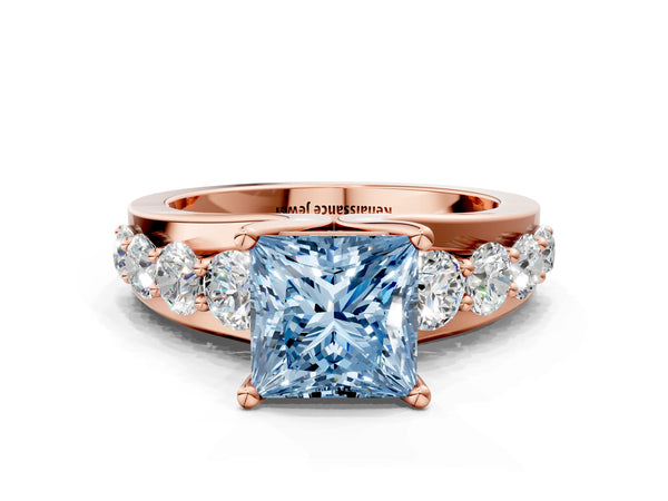 Rose gold Fancy Blue Princess  Brilliant Solitaire with Side Stones on a Pave Band and Four-Prong Setting