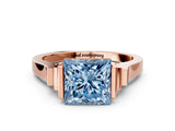 Rose gold Fancy Blue Princess Cut Brilliant Solitaire Diamond Ring with Channel Set Band and Bar Prong Setting