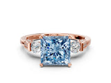 Rose gold Fancy Blue Princess Cut Brilliant Three-Stone Pave Band with Four-Prong Setting