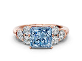 Rose gold Fancy Blue Princess  Cut Diamond Cluster Ring with Round Accent Stones and Prong Setting on a Classic Band_49