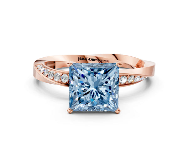 Rose gold Fancy Blue Princess Cut Diamond Engagement Ring with Side Stone Accents and Four-Prong Setting