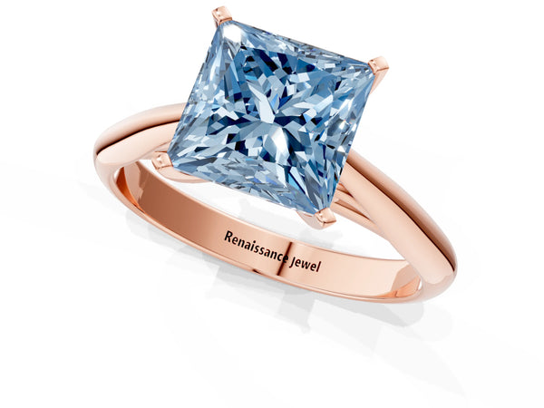 Rose gold Fancy Blue Princess Cut Diamond Solitaire Engagement Ring with Cathedral Setting and Four-Prong Mount