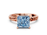 Rose gold Fancy Blue Princess  Solitaire Diamond Engagement Ring with XO Engraved Band and Four-Prong Setting 1