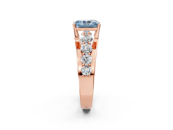Rose gold Fancy Blue Radiant  Brilliant Solitaire with Side Stones on a Pave Band and Four-Prong Setting