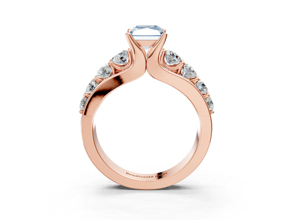 Rose gold Fancy Blue Radiant  Brilliant Solitaire with Side Stones on a Pave Band and Four-Prong Setting