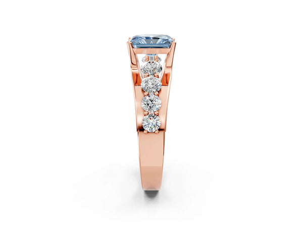Rose gold Fancy Blue Radiant  Brilliant Solitaire with Side Stones on a Pave Band and Four-Prong Setting