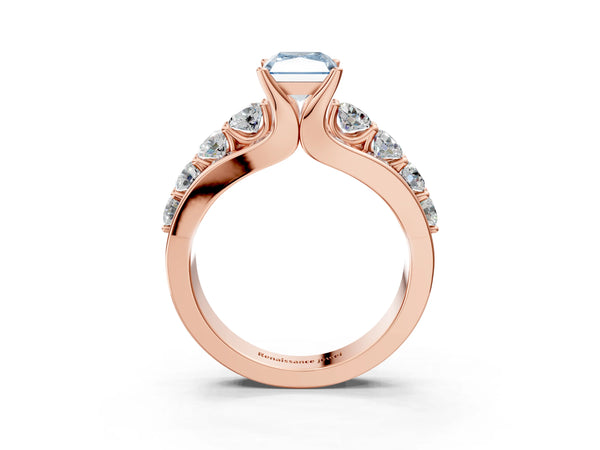 Rose gold Fancy Blue Radiant  Brilliant Solitaire with Side Stones on a Pave Band and Four-Prong Setting