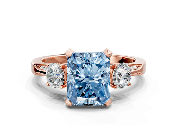 Rose gold Fancy Blue Radiant Cut Brilliant Three-Stone Diamond Ring with Pavé Band and Four-Prong Setting
