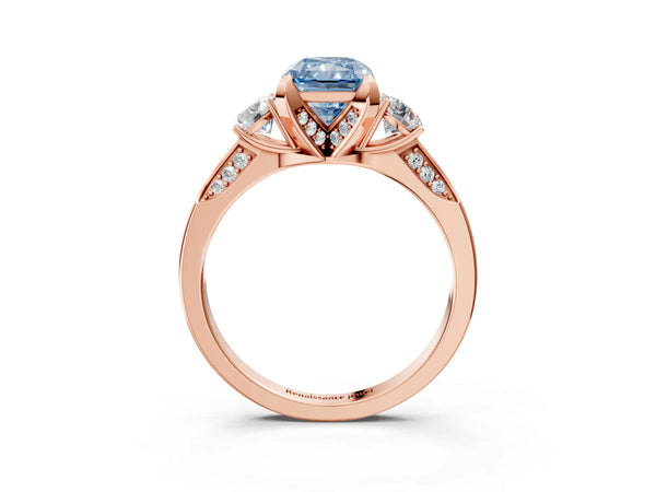 Rose gold Fancy Blue Radiant Cut Brilliant Three-Stone Diamond Ring with Pavé Band and Four-Prong Setting