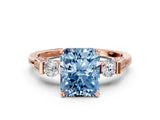 Rose gold Fancy Blue Radiant Cut Brilliant Three-Stone Pave Band with Four-Prong Setting