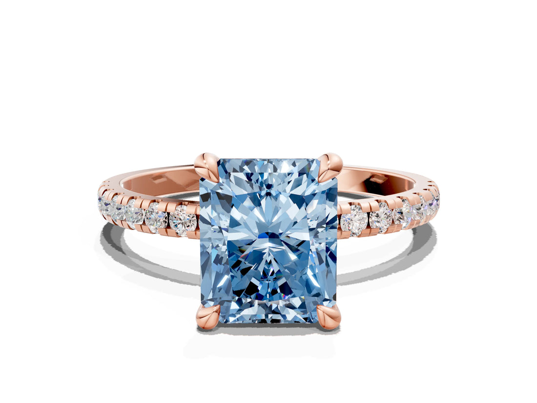 Rose gold Fancy Blue Radiant Cut Diamond Brilliant Solitaire Ring with Pavé Band and Four-Prong Setting