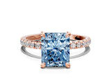 Rose gold Fancy Blue Radiant Cut Diamond Brilliant Solitaire Ring with Pavé Band and Four-Prong Setting