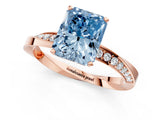 Rose gold Fancy Blue Radiant Cut Diamond Engagement Ring with Side Stone Accents and Four-Prong Setting_85