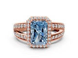 Rose gold Fancy Blue Radiant Cut Diamond Halo Ring with Split Shank Pavé Band and Four-Prong Setting
