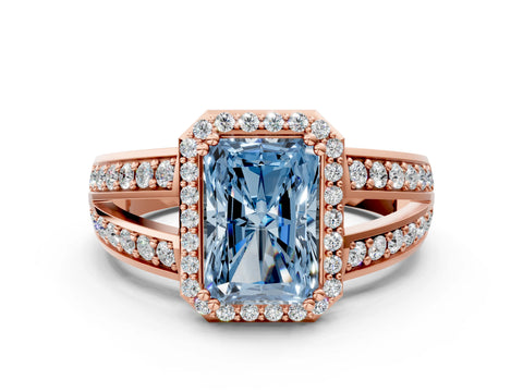 Rose gold Fancy Blue Radiant Cut Diamond Halo Ring with Split Shank Pavé Band and Four-Prong Setting
