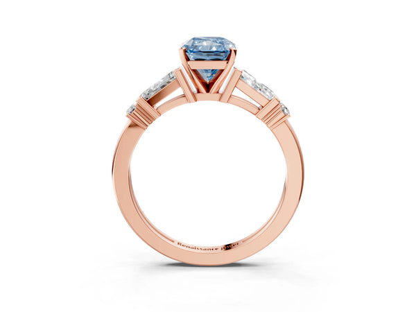 Rose gold Fancy Blue Radiant  Cut Diamond Ring with Baguette Side Stones, Channel Set Band, and Four-Prong Setting