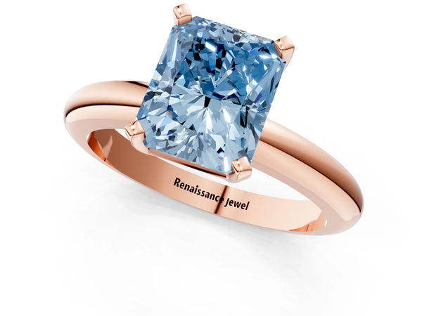 Rose gold Fancy Blue Radiant Cut Diamond Solitaire Engagement Ring with Round Band and Four-Prong Setting