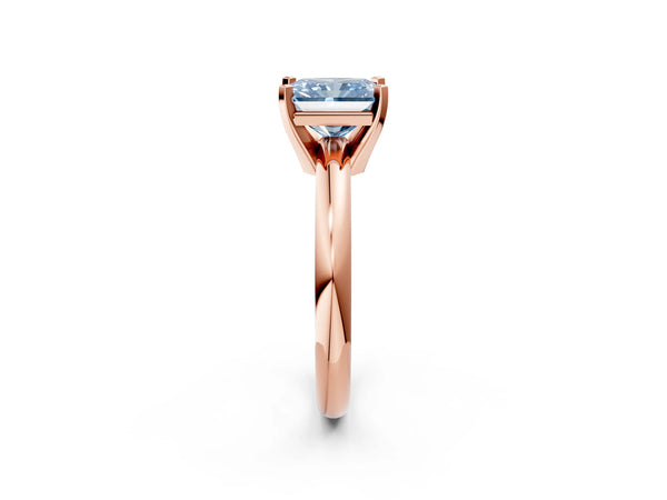 Rose gold Fancy Blue Radiant Cut Diamond Solitaire Engagement Ring with Round Band and Four-Prong Setting