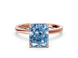 Rose gold Fancy Blue Radiant Cut Diamond Solitaire Ring with Classic Band and Four-Prong Setting