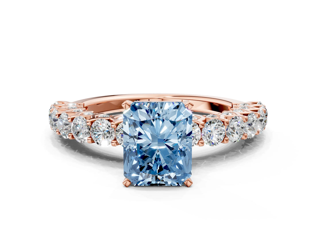 Rose gold Fancy Blue Radiant Cut Diamond Solitaire Ring with Shared Prong Pavé Band and Four-Prong Setting_57