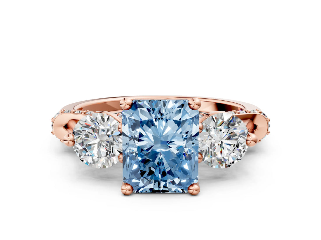 Rose gold Fancy Blue Radiant Cut Diamond Three-Stone Ring with Prong Setting and Pavé Band
