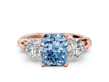 Rose gold Fancy Blue Radiant Cut Diamond Three-Stone Ring with Prong Setting and Pavé Band
