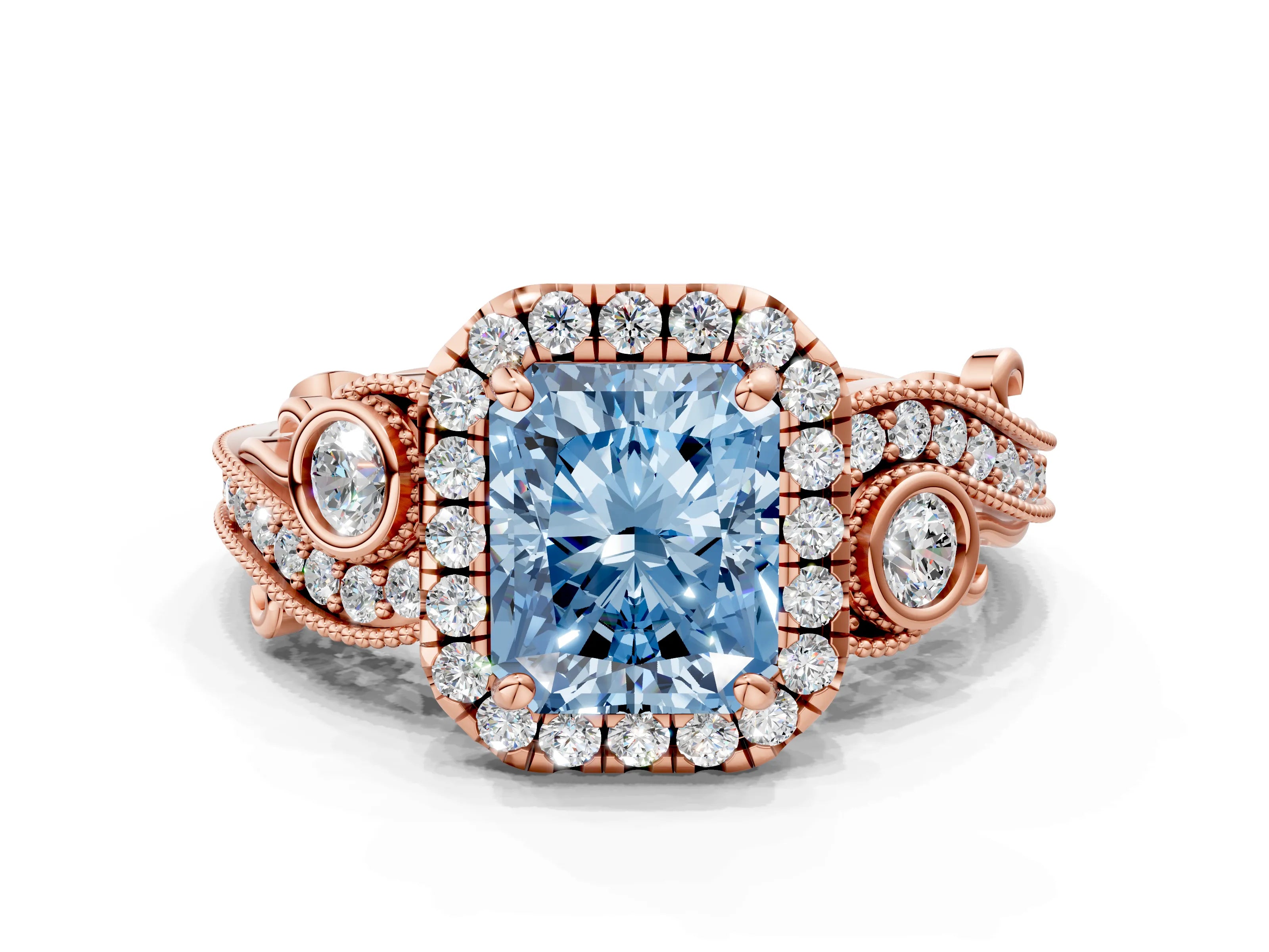 Rose gold Fancy Blue Radiant Cut Halo Diamond Ring with Milgrain and Bezel Accents on a Split Shank Band