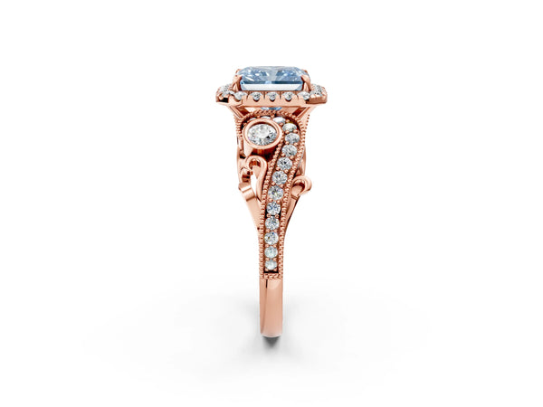 Rose gold Fancy Blue Radiant Cut Halo Diamond Ring with Milgrain and Bezel Accents on a Split Shank Band