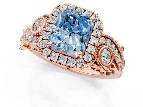 Rose gold Fancy Blue Radiant Cut Halo Diamond Ring with Milgrain and Bezel Accents on a Split Shank Band_1