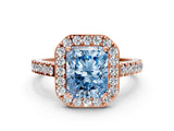 Rose gold Fancy Blue Radiant Cut Halo Diamond Ring with Pavé Band and Three-Prong Setting