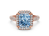 Rose gold Fancy Blue Radiant Cut Halo Diamond Ring with Pavé Band