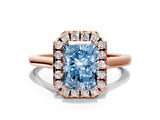 Rose gold Fancy Blue Radiant Cut Halo Round Diamond Solitaire Ring with Pavé Band and Four-Prong Setting