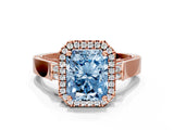 Rose gold Fancy Blue Radiant Cut Halo Round Diamond Twist Band with Four-Prong Setting