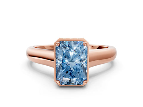Rose gold Fancy Blue Radiant Cut Solitaire Diamond Engagement Ring with Four-Prong Setting and Tapered Band